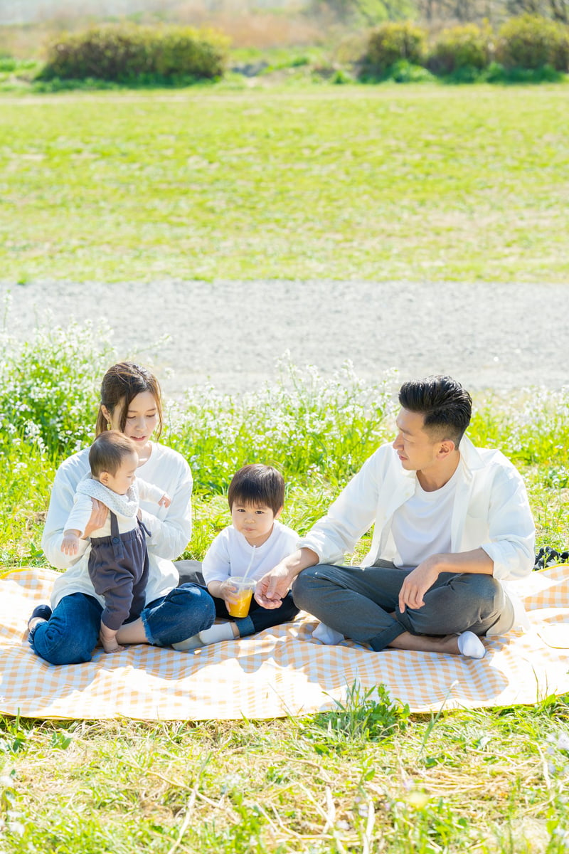 Parents and children enjoying a picnic